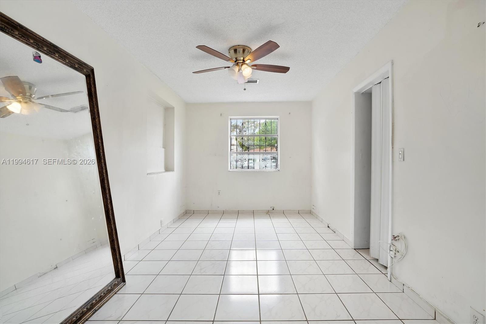6810 Southwest 1st Street Miami, FL 33144 - Photo 5 of 17 a view of an entryway with wooden floor