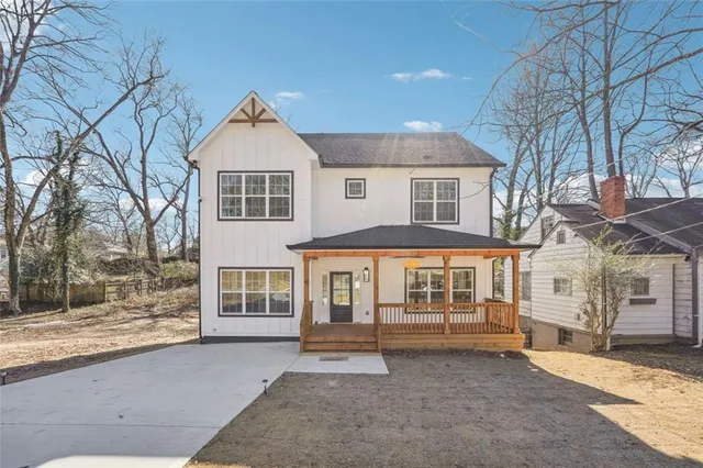 a front view of a house with a porch