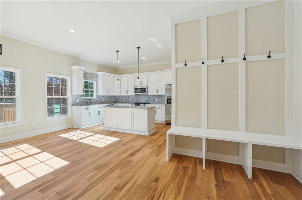 1620 Derry Avenue Southwest Atlanta, GA 30310 - Photo 23 of 47 a view of kitchen with wooden floor and window