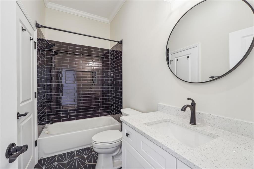 1620 Derry Avenue Southwest Atlanta, GA 30310 - Photo 25 of 47 a bathroom with a sink toilet and a mirror