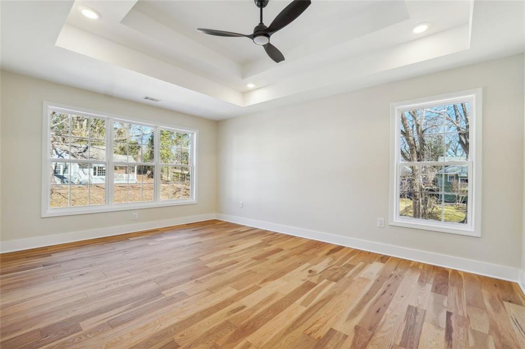 1620 Derry Avenue Southwest Atlanta, GA 30310 - Photo 35 of 47 a view of an empty room with wooden floor and a window