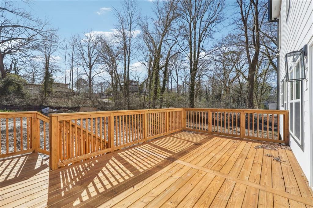 1620 Derry Avenue Southwest Atlanta, GA 30310 - Photo 40 of 47 a view of balcony with wooden floor and fence