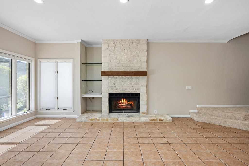 805 Highway 534 Loop Kerrville, TX 78028 - Photo 12 of 27 Living Room / Den with fireplace