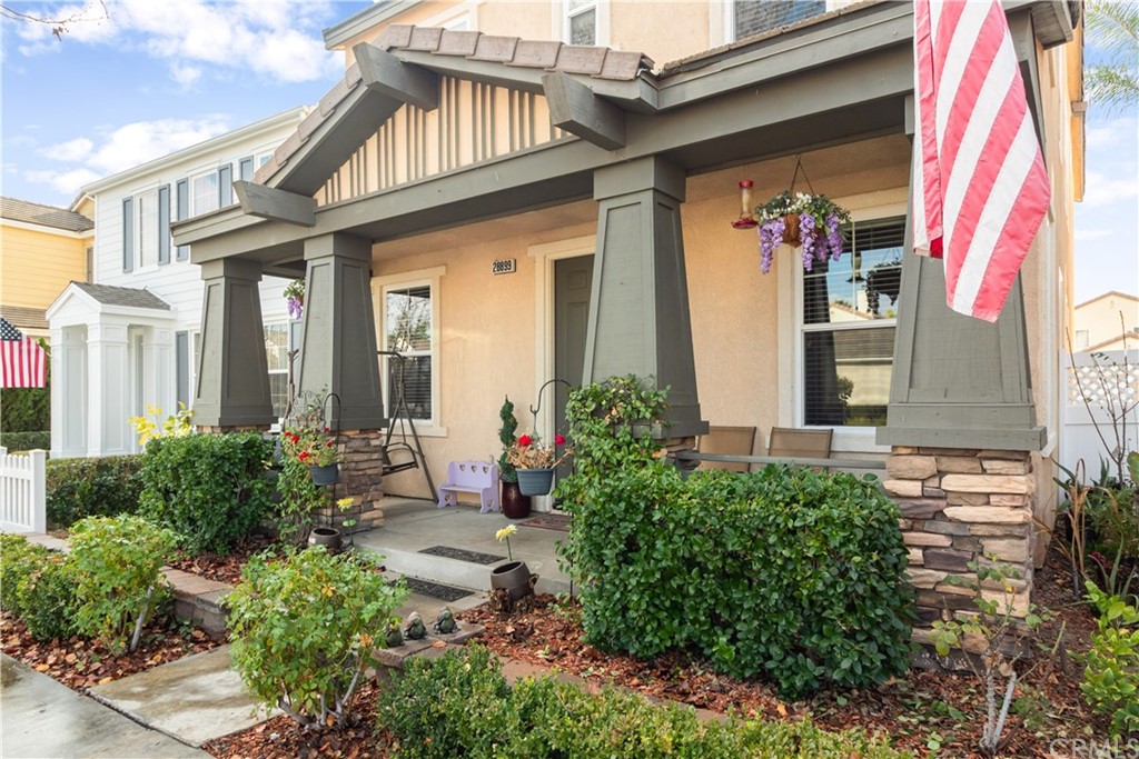28899 Booth Bay Road Temecula, CA 92591 - Photo 1 of 1 a view of a brick house with potted plants