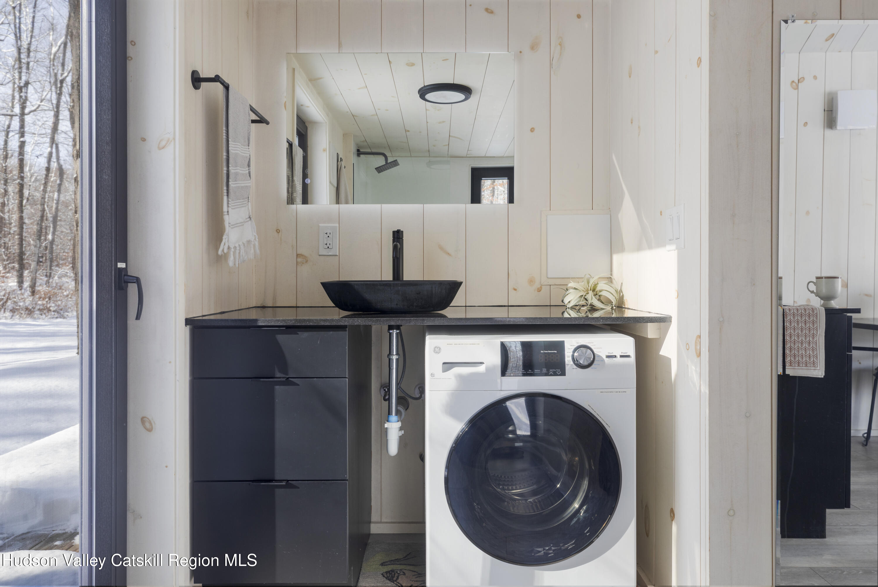 692 Blenheim Hill Road Jefferson, NY 12093 - Photo 13 of 21 a utility room with closet dryer and windows