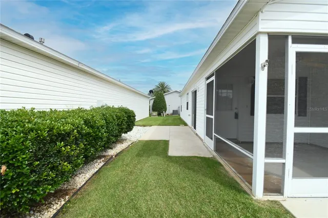 a view of a back yard of the house