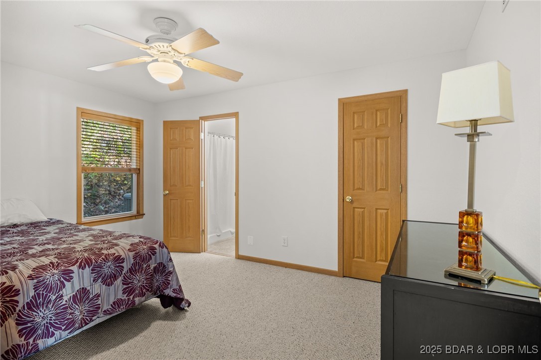 48 Boot Circle Camdenton, MO 65020 - Photo 14 of 44 Main level Primary Bedroom