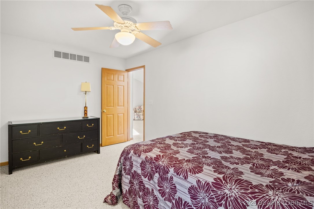 48 Boot Circle Camdenton, MO 65020 - Photo 15 of 44 Main level Primary Bedroom