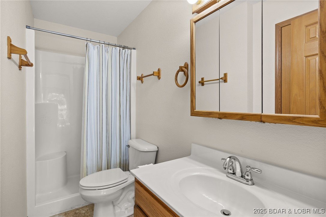 48 Boot Circle Camdenton, MO 65020 - Photo 25 of 44 Lower level bathroom