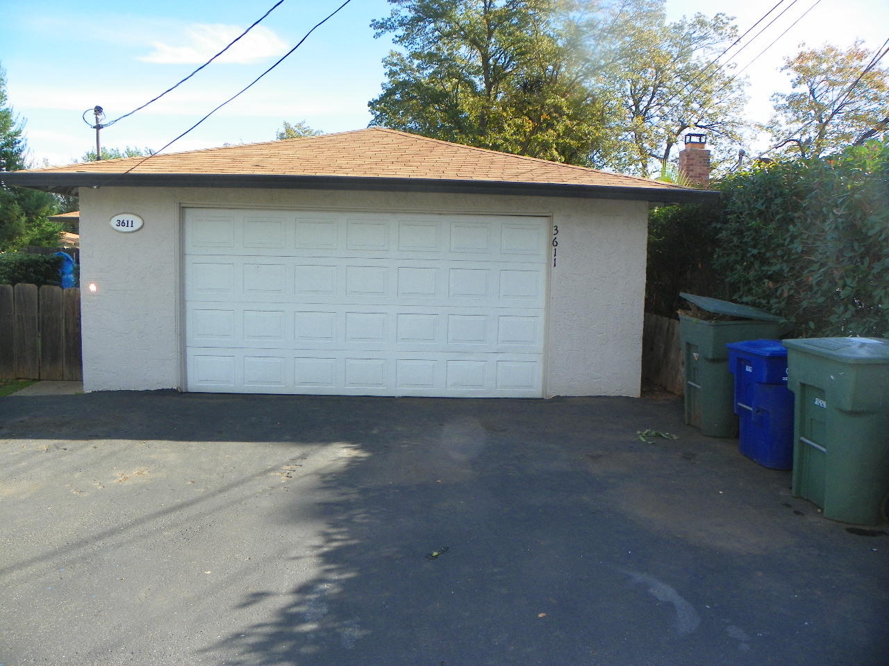 3601 Echo Road Redding, CA 96002 - Photo 2 of 13 a side view of a house with garage
