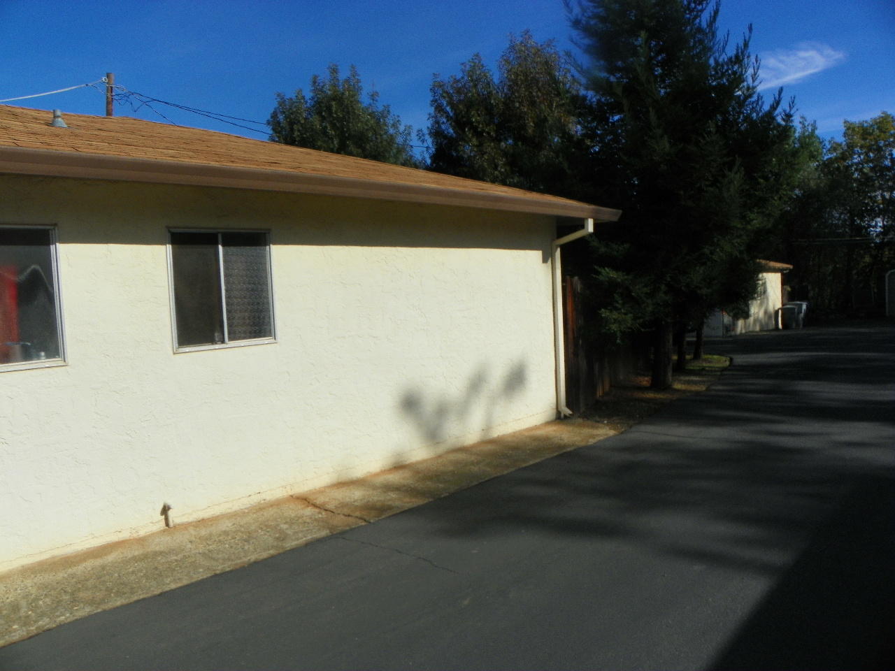 3601 Echo Road Redding, CA 96002 - Photo 7 of 13 a side view of a house with a yard