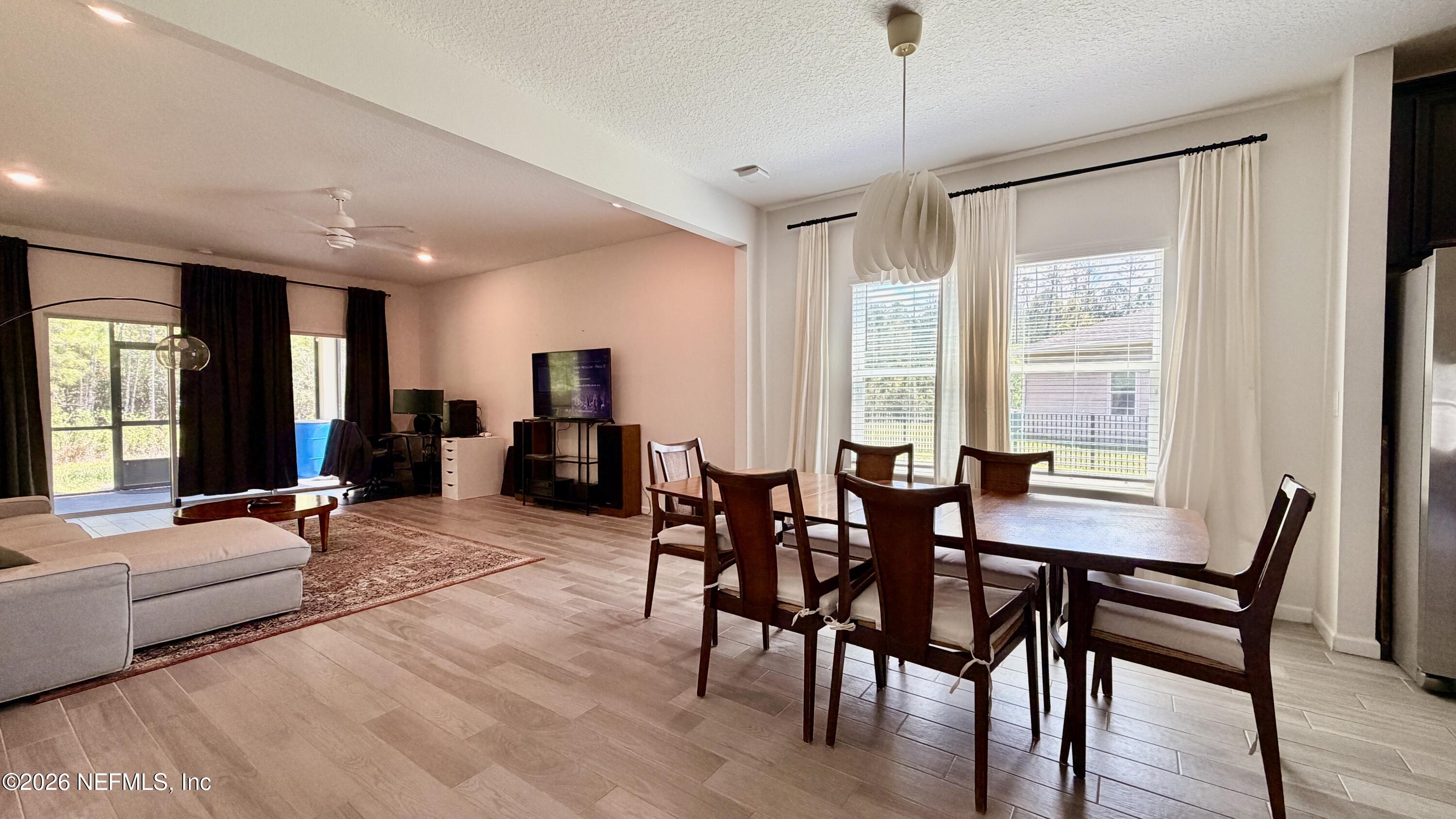 37 Saba Lane St. Augustine, FL 32092 - Photo 21 of 42 a view of a dining room with furniture window and outside view