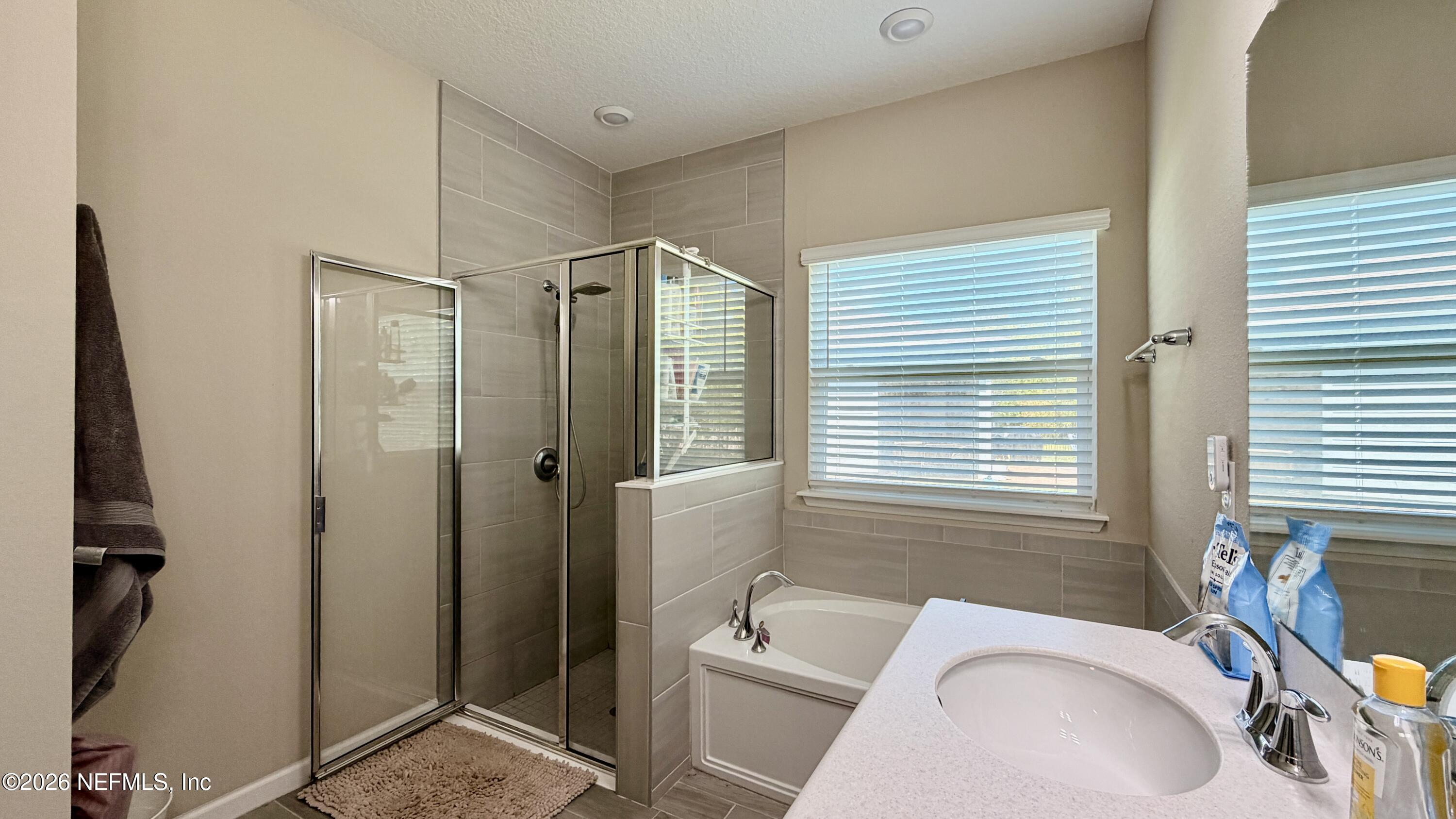 37 Saba Lane St. Augustine, FL 32092 - Photo 29 of 42 a bathroom with a granite countertop sink toilet and shower