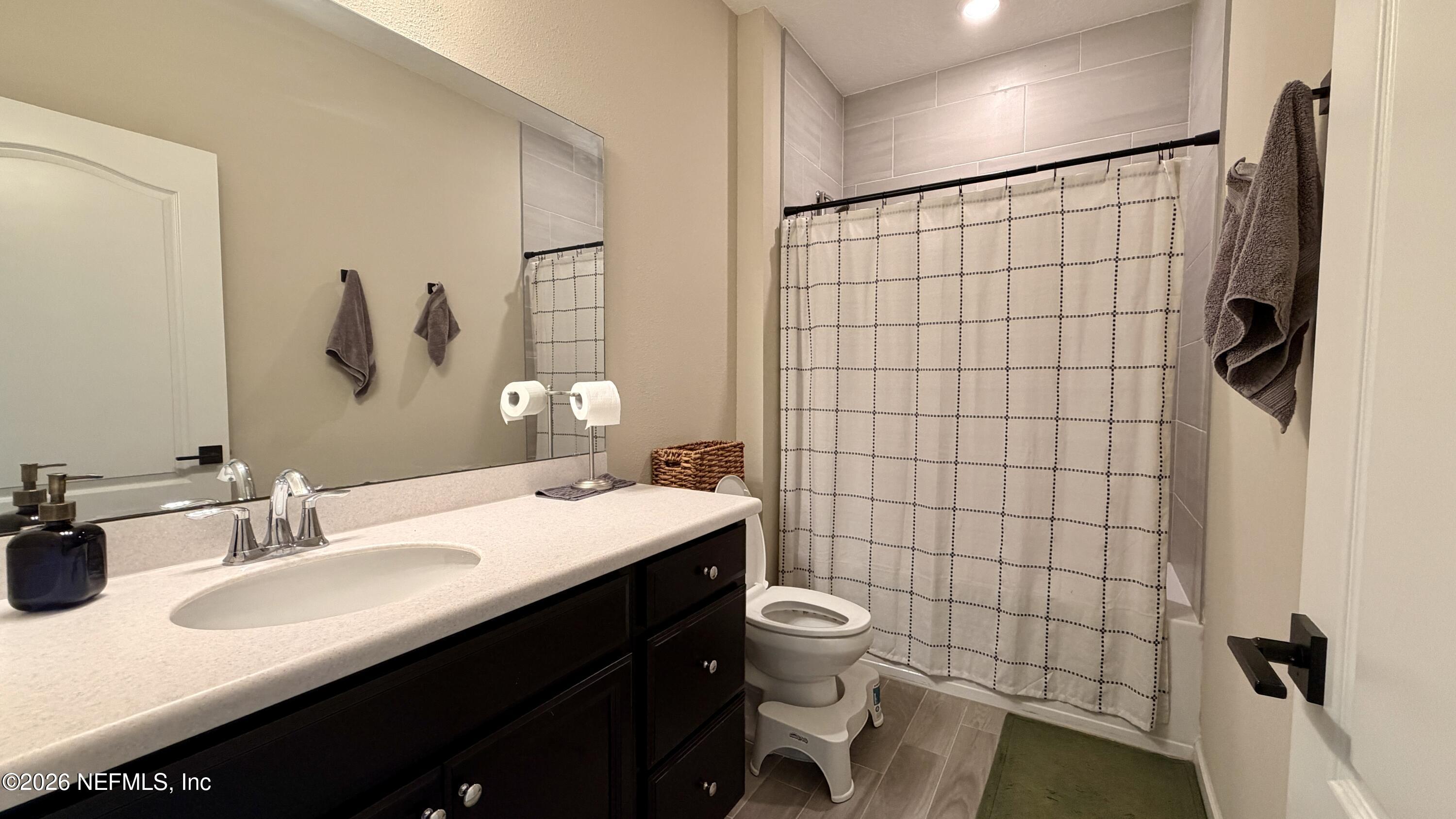 37 Saba Lane St. Augustine, FL 32092 - Photo 39 of 42 a bathroom with a sink toilet and shower