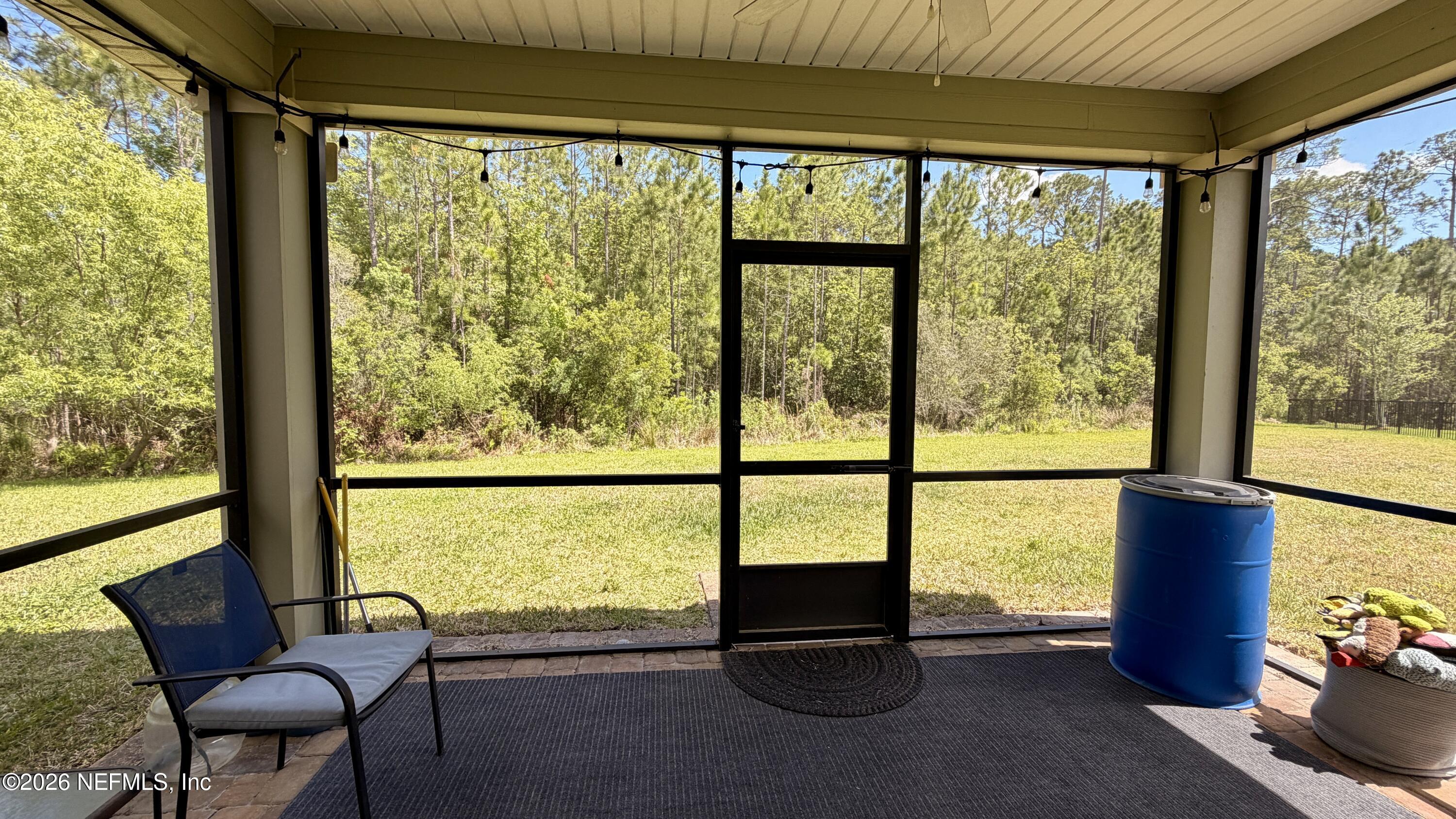 37 Saba Lane St. Augustine, FL 32092 - Photo 40 of 42 a view of a room with furniture and a large window