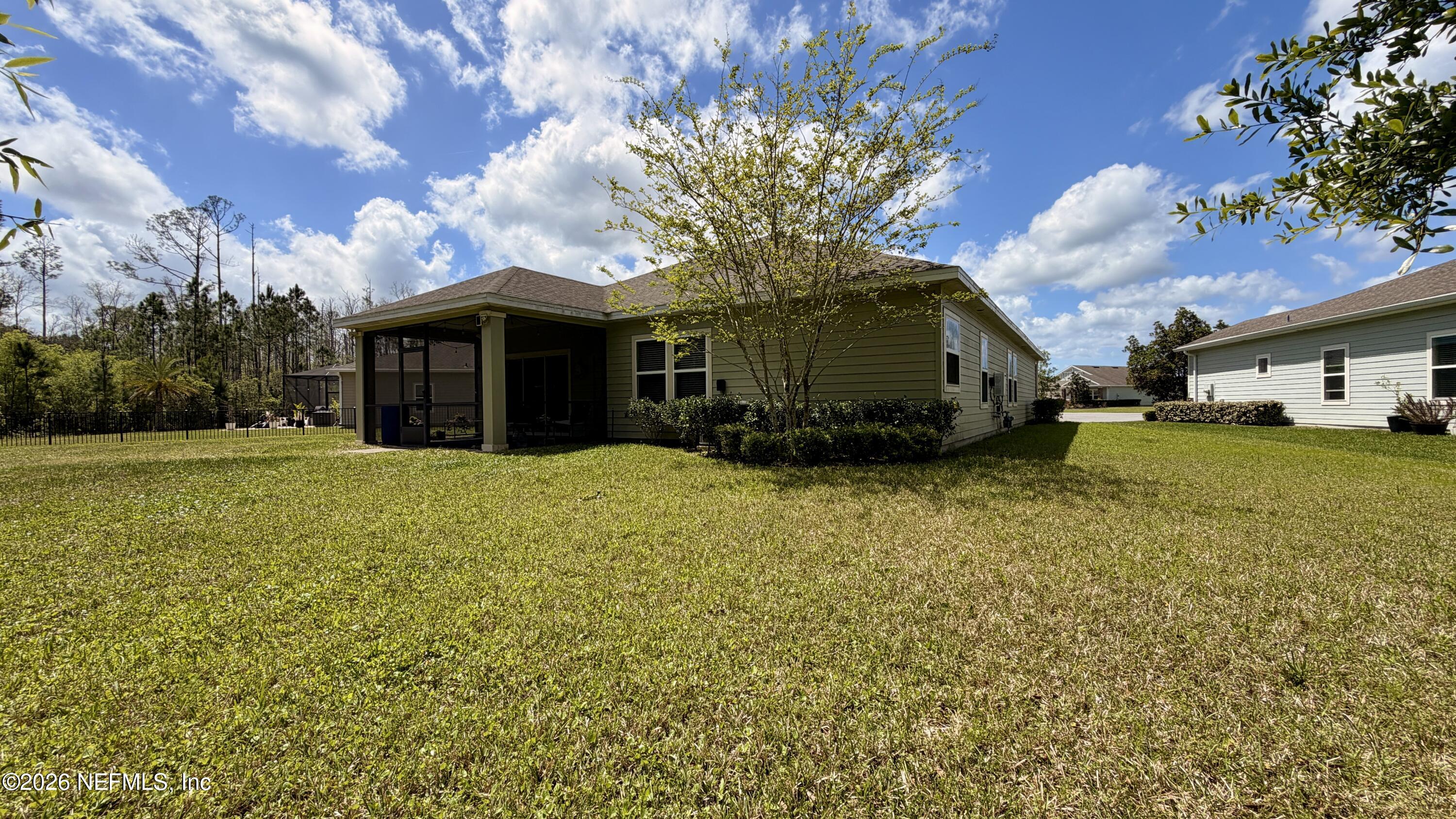 37 Saba Lane St. Augustine, FL 32092 - Photo 5 of 42 a view of a house with a yard