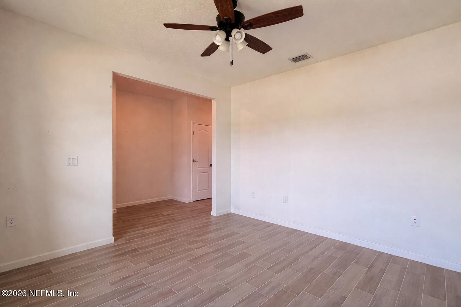 37 Saba Lane St. Augustine, FL 32092 - Photo 10 of 42 wooden floor in an empty room