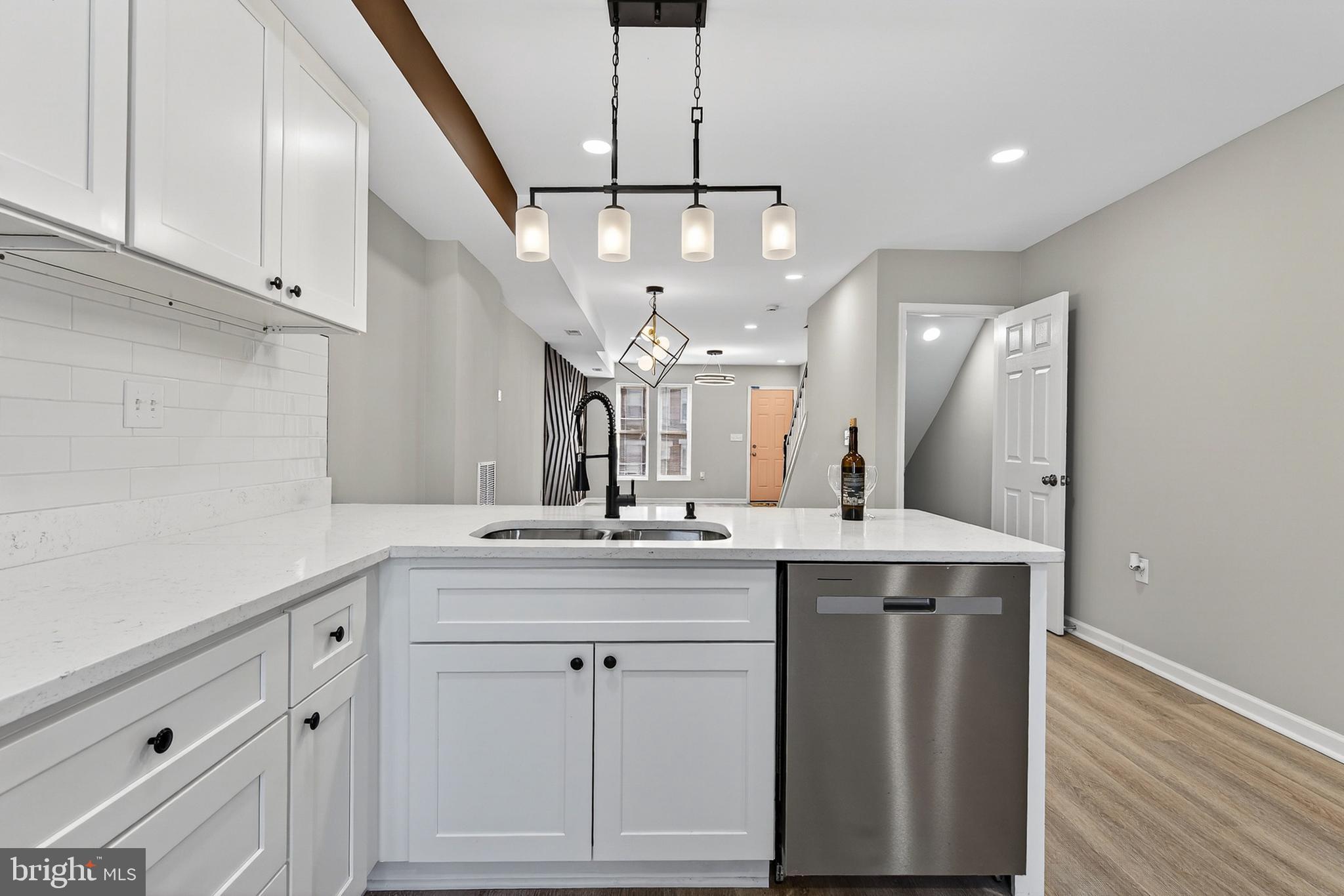 2822 Harlem Avenue Baltimore, MD 21216 - Photo 4 of 33 a view of a kitchen counter space and window