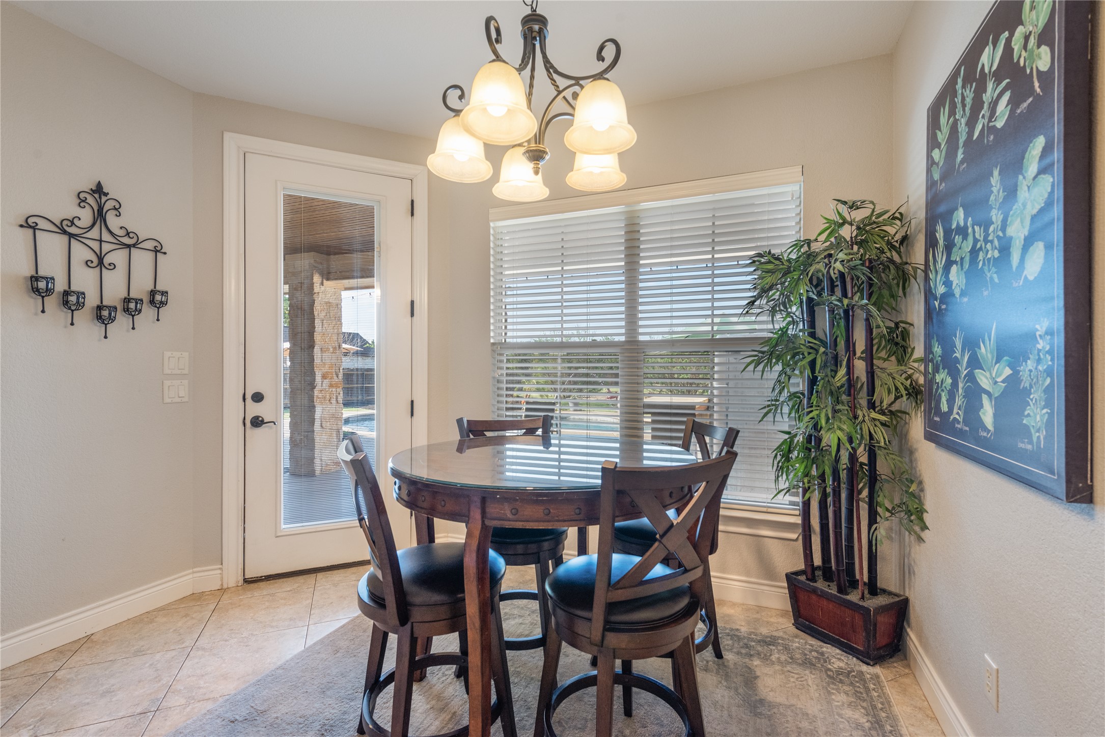 120 Layton Way Georgetown, TX 78633 - Photo 15 of 40 a view of a dining room with furniture and window