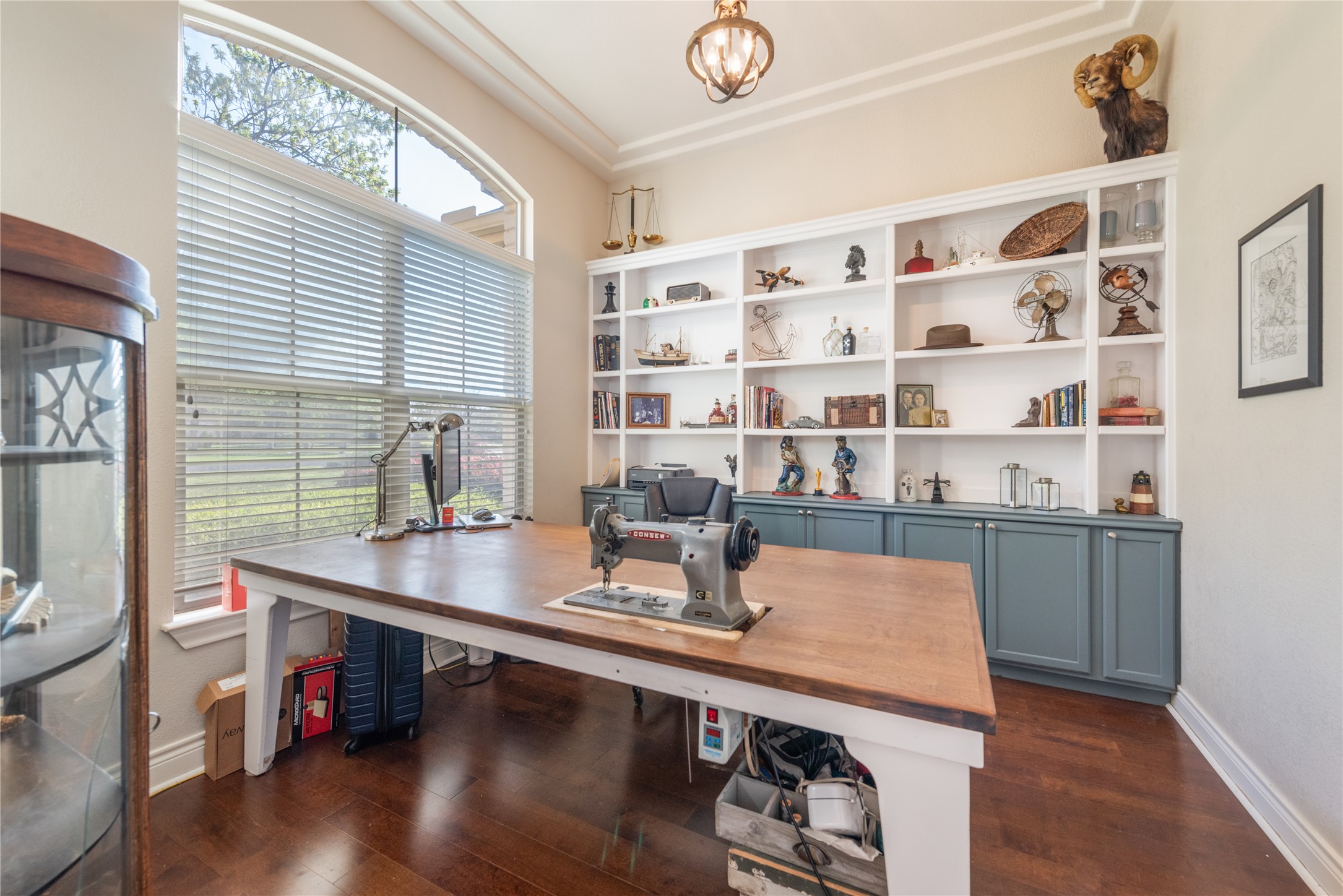 120 Layton Way Georgetown, TX 78633 - Photo 16 of 40 a room with a table chairs and wooden floor