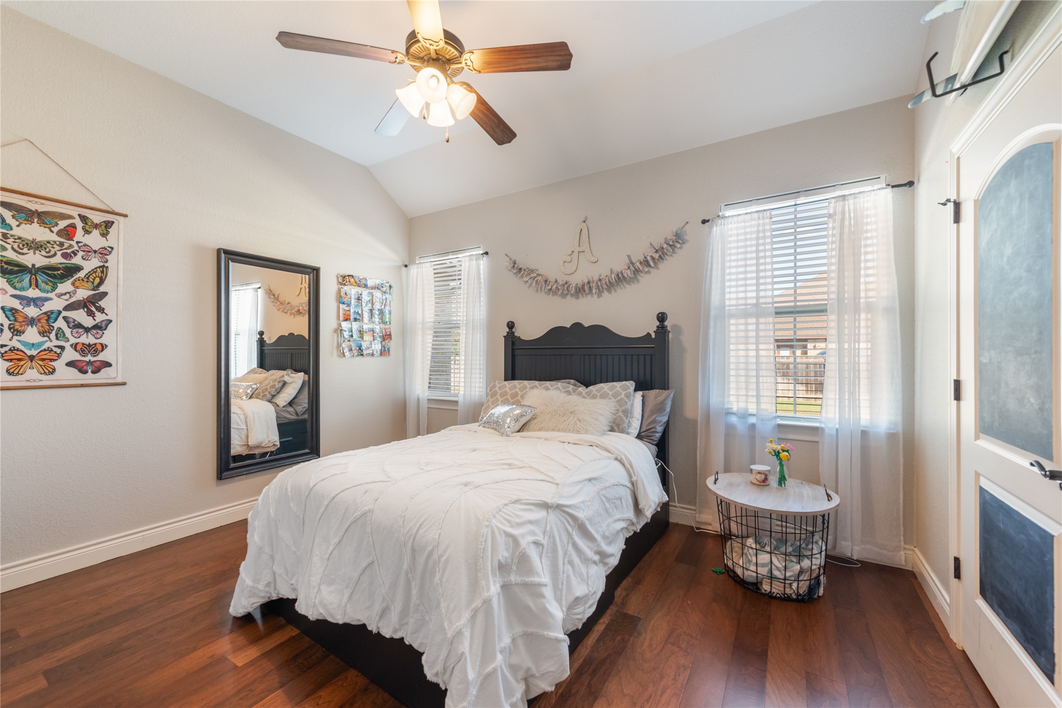 120 Layton Way Georgetown, TX 78633 - Photo 27 of 40 a bedroom with a bed and a wooden floor