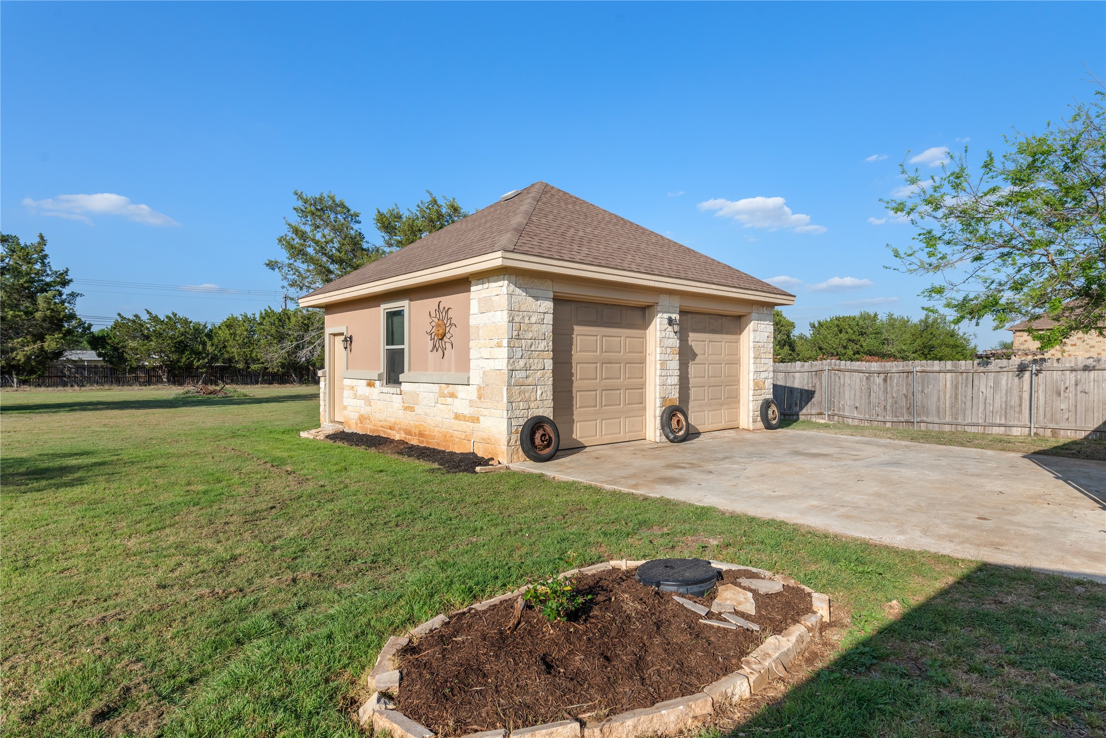 120 Layton Way Georgetown, TX 78633 - Photo 34 of 40 a view of a house with backyard and garden
