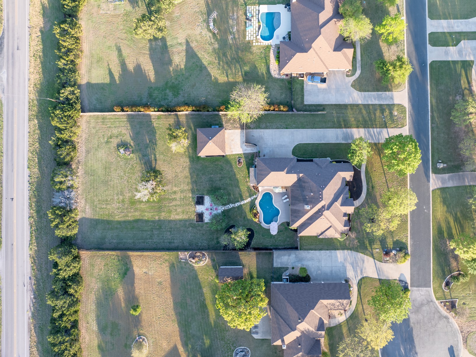 120 Layton Way Georgetown, TX 78633 - Photo 39 of 40 an aerial view of a house with a garden and trees
