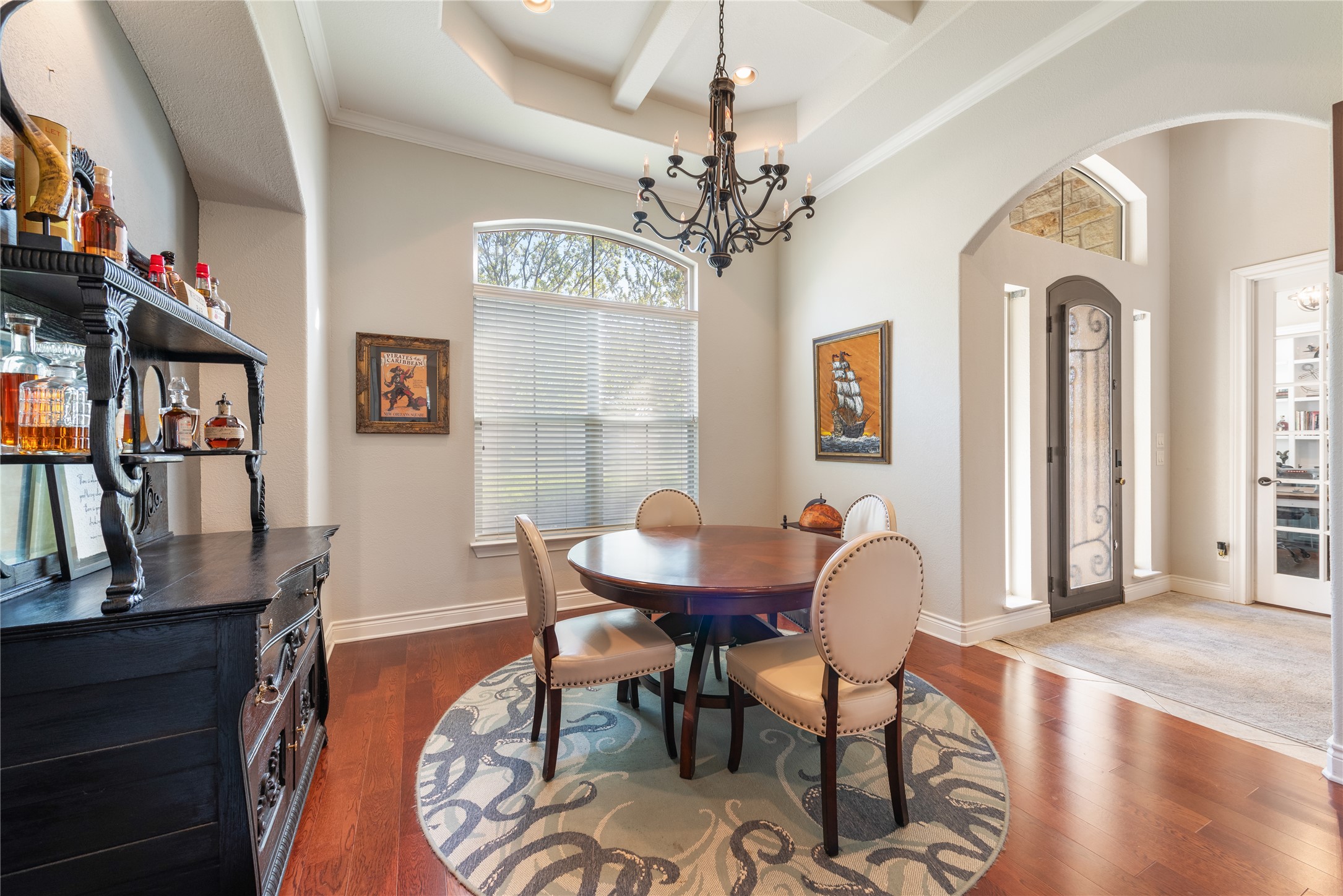 120 Layton Way Georgetown, TX 78633 - Photo 6 of 40 a view of a dining room with furniture wooden floor and chandelier
