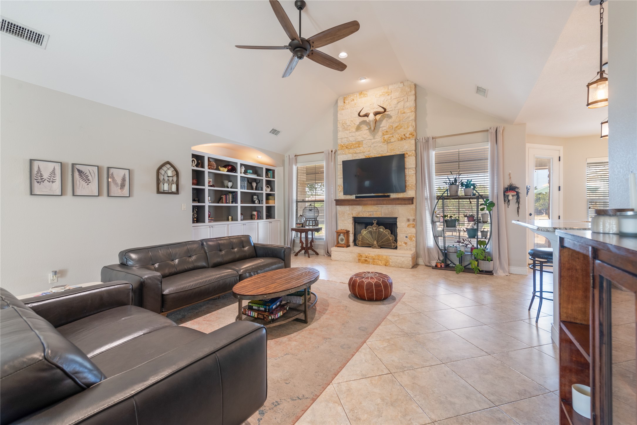 120 Layton Way Georgetown, TX 78633 - Photo 10 of 40 a living room with furniture and a fireplace