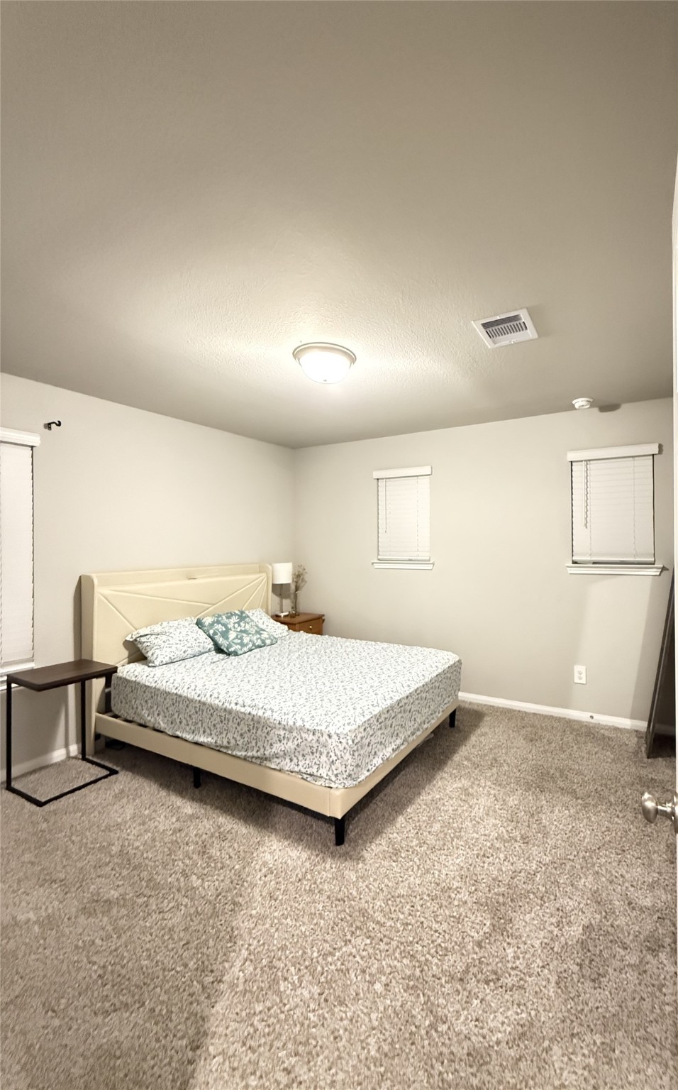 10807 Sugar Pne Lane Rosharon, TX 77583 - Photo 15 of 20 a spacious bedroom with a bed and a cabinets