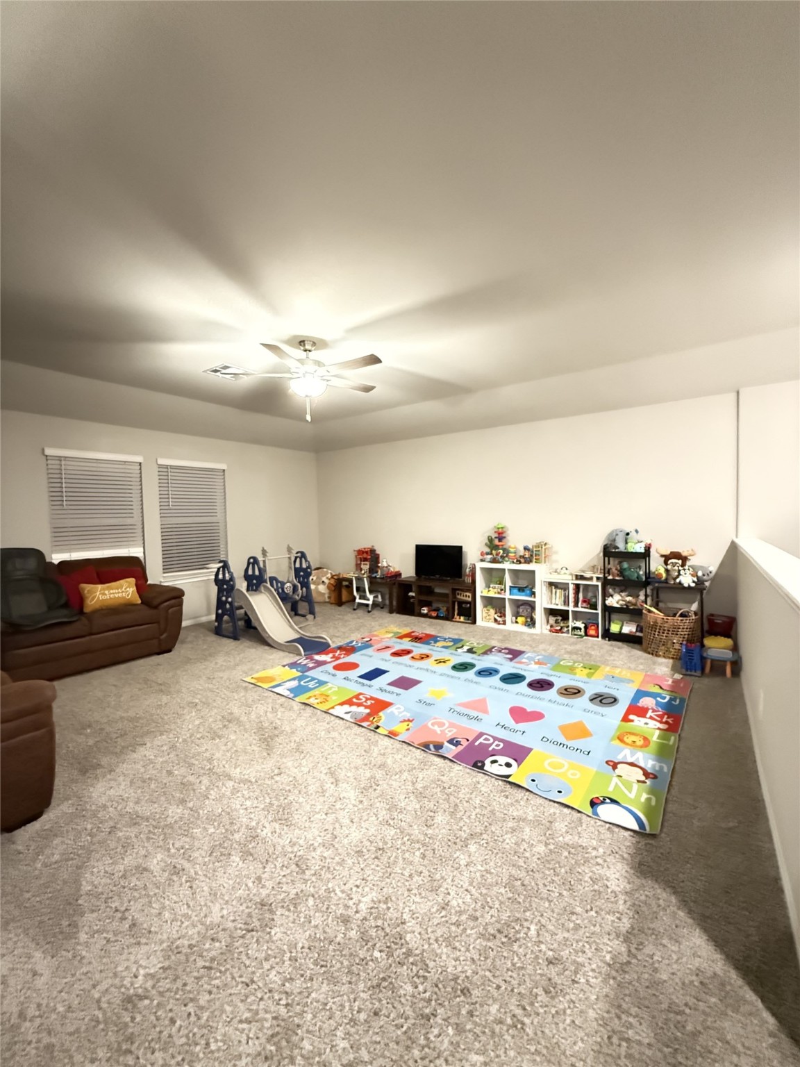 10807 Sugar Pne Lane Rosharon, TX 77583 - Photo 17 of 20 a living room with furniture and a table