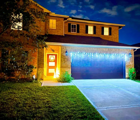 a view of an ocean and a grassy field