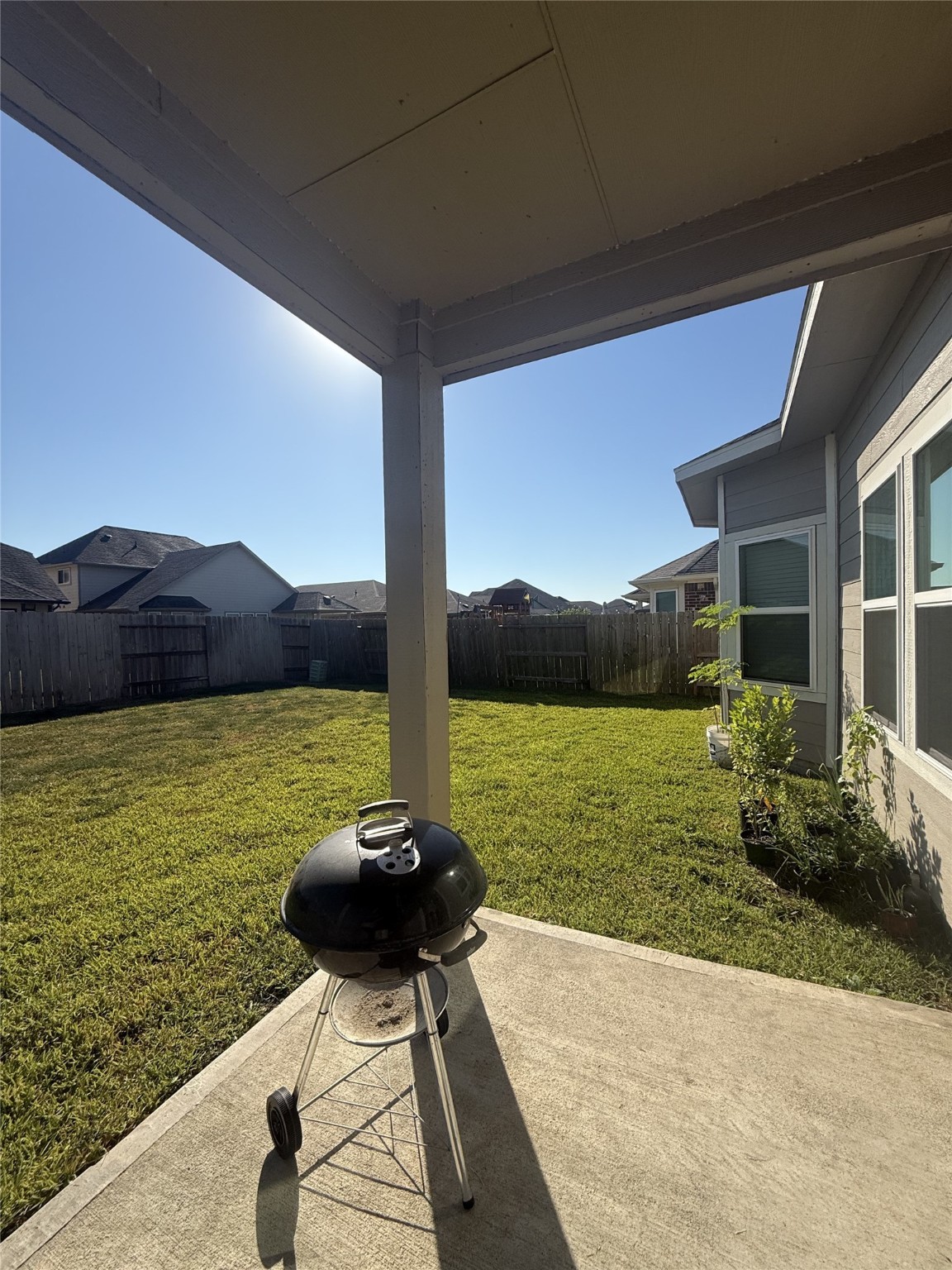 10807 Sugar Pne Lane Rosharon, TX 77583 - Photo 19 of 20 a view of a lake with a garden and patio