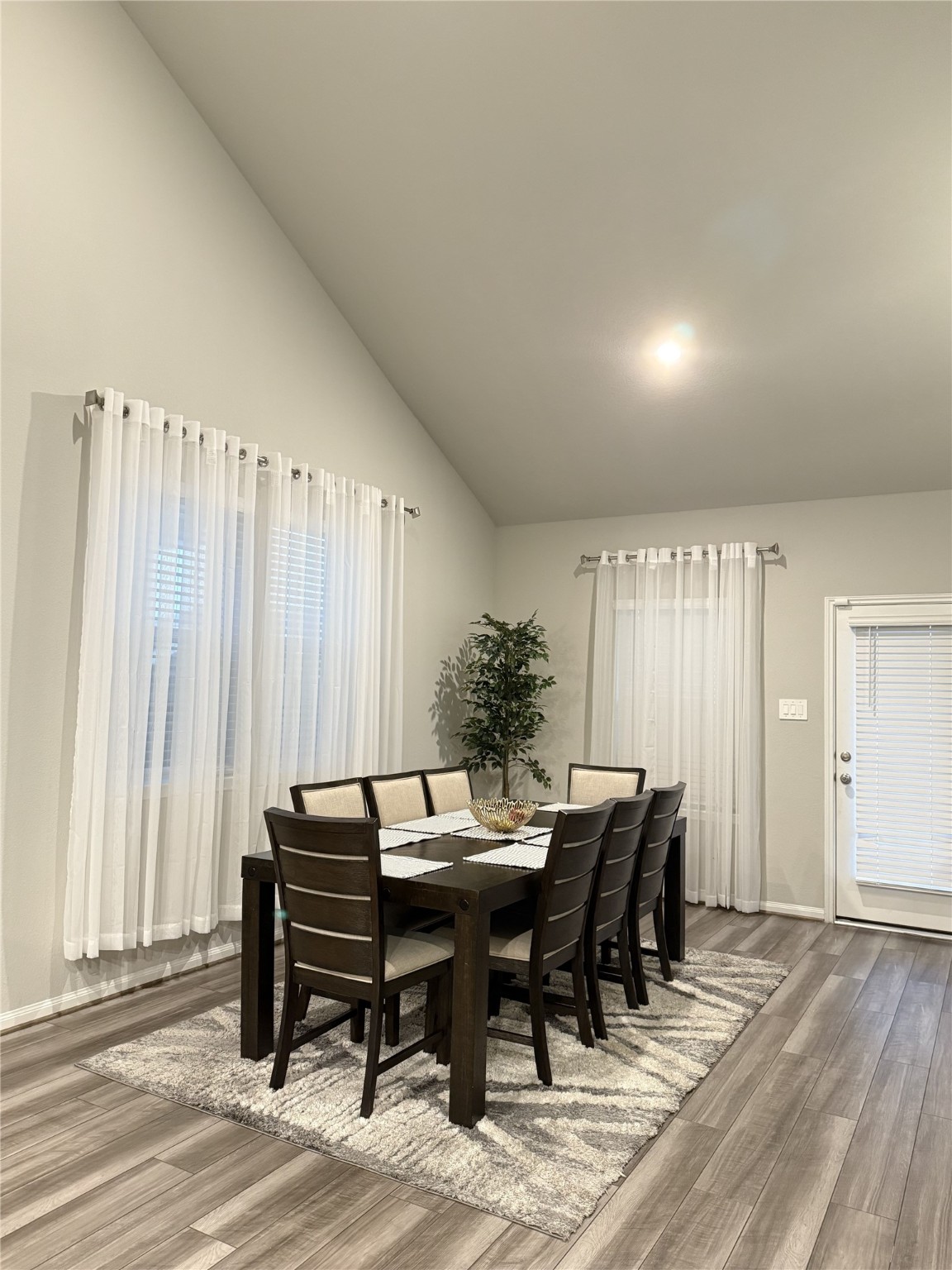 10807 Sugar Pne Lane Rosharon, TX 77583 - Photo 6 of 20 a view of a dining room with furniture and window