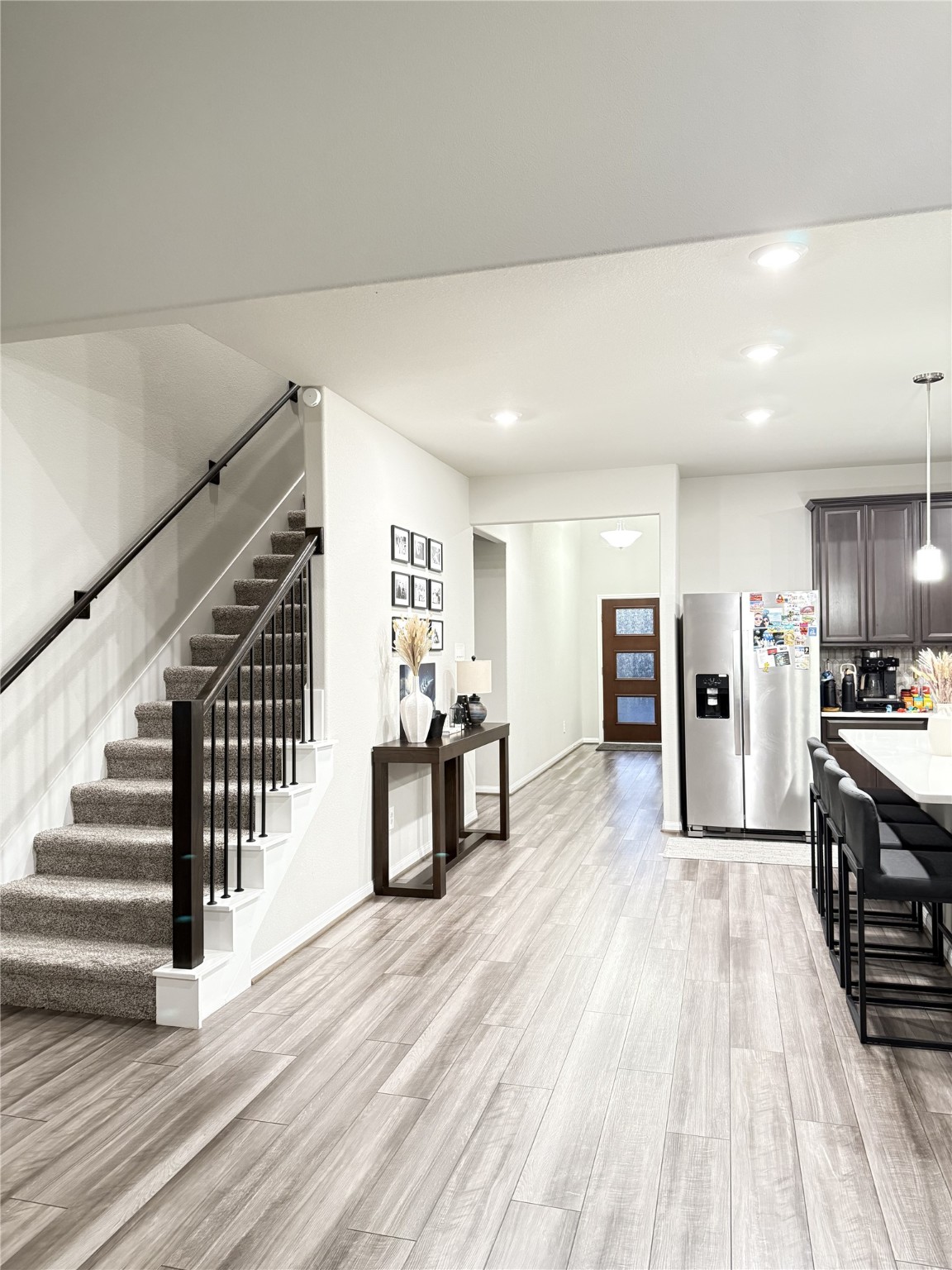 10807 Sugar Pne Lane Rosharon, TX 77583 - Photo 8 of 20 a view of kitchen with furniture and wooden floor