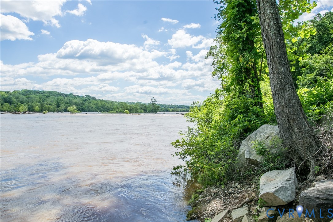 2831 Braidwood Road Richmond, VA 23225 - Photo 49 of 50 a view of a lake from a yard