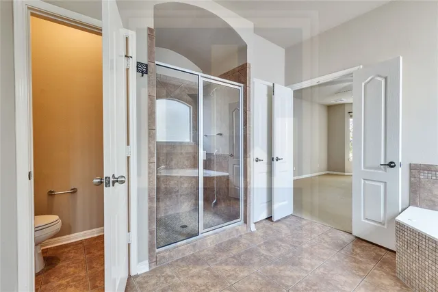 a view of entryway with wooden floor and door