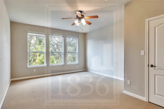 a bathroom with a sink a toilet a mirror and bathtub