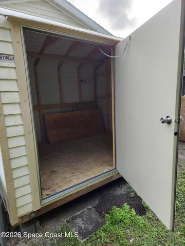 a bathroom with a glass door