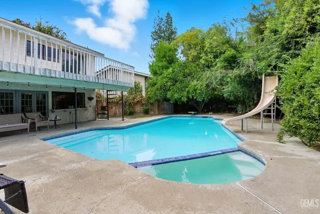 an outdoor space with swimming pool