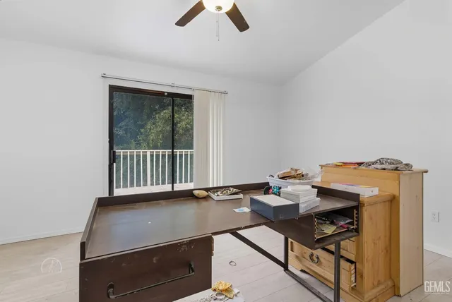 a view of workspace with lounge chair