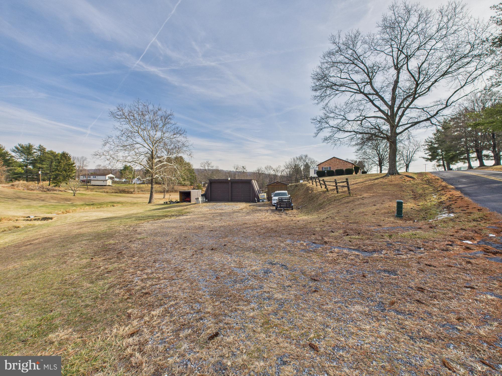 364 Bethel Grange Road Winchester, VA 22603 - Photo 11 of 52 a view of dirt yard with a large tree