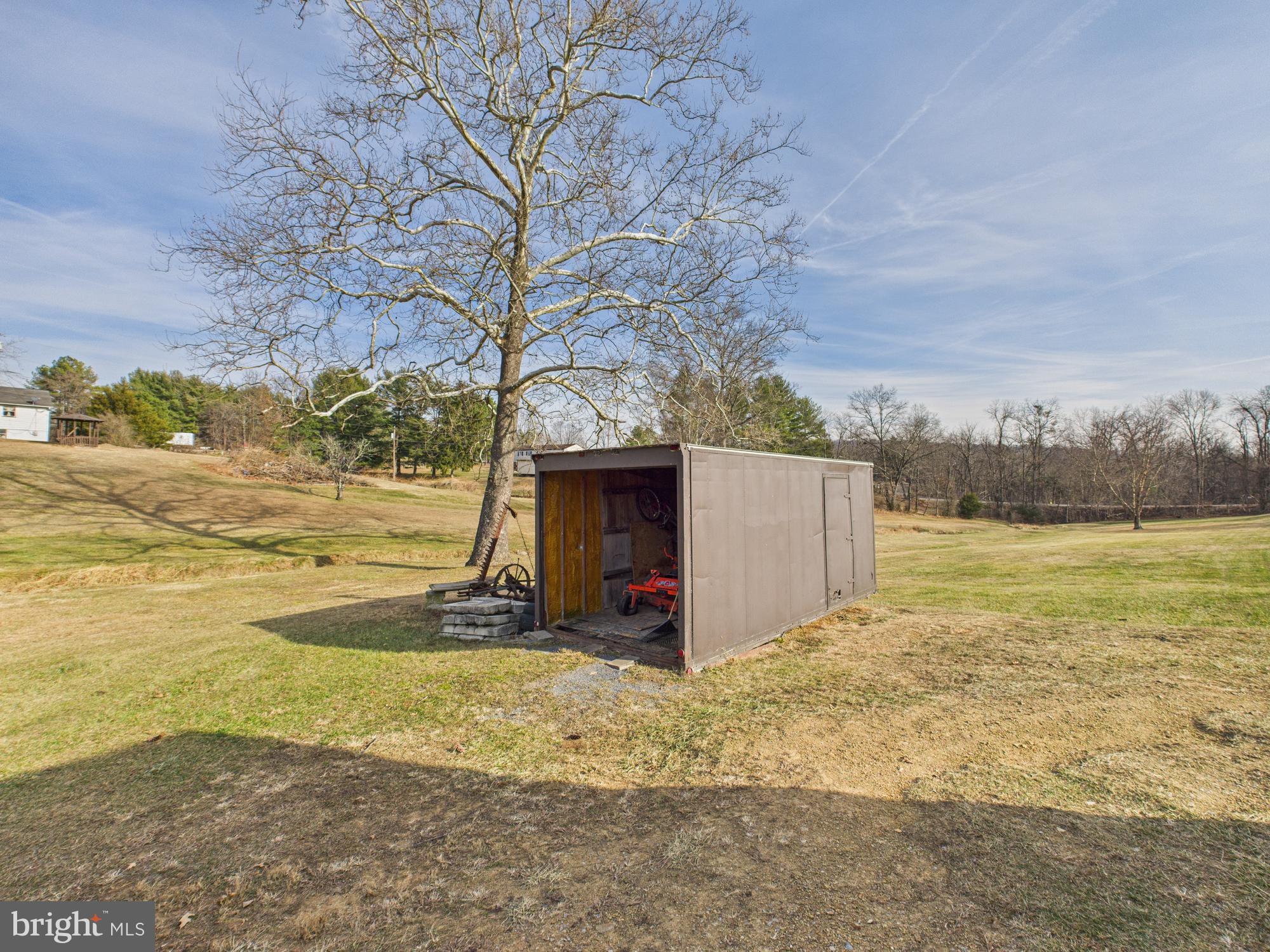 364 Bethel Grange Road Winchester, VA 22603 - Photo 15 of 52 a view of a backyard with large tree