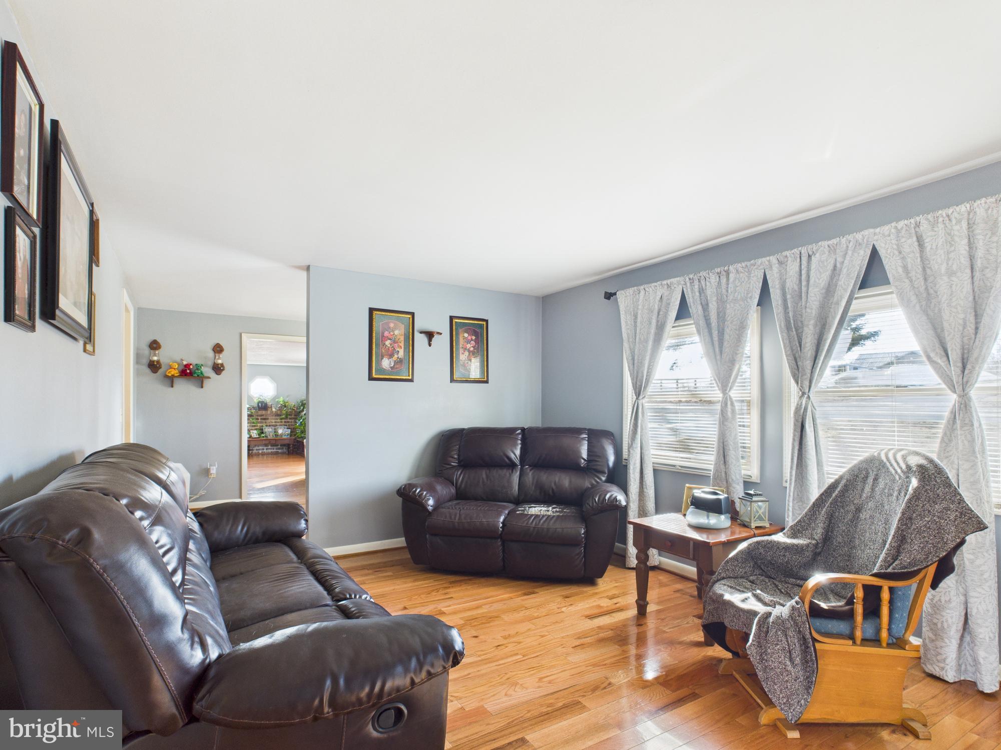 364 Bethel Grange Road Winchester, VA 22603 - Photo 20 of 52 a living room with furniture and a large window
