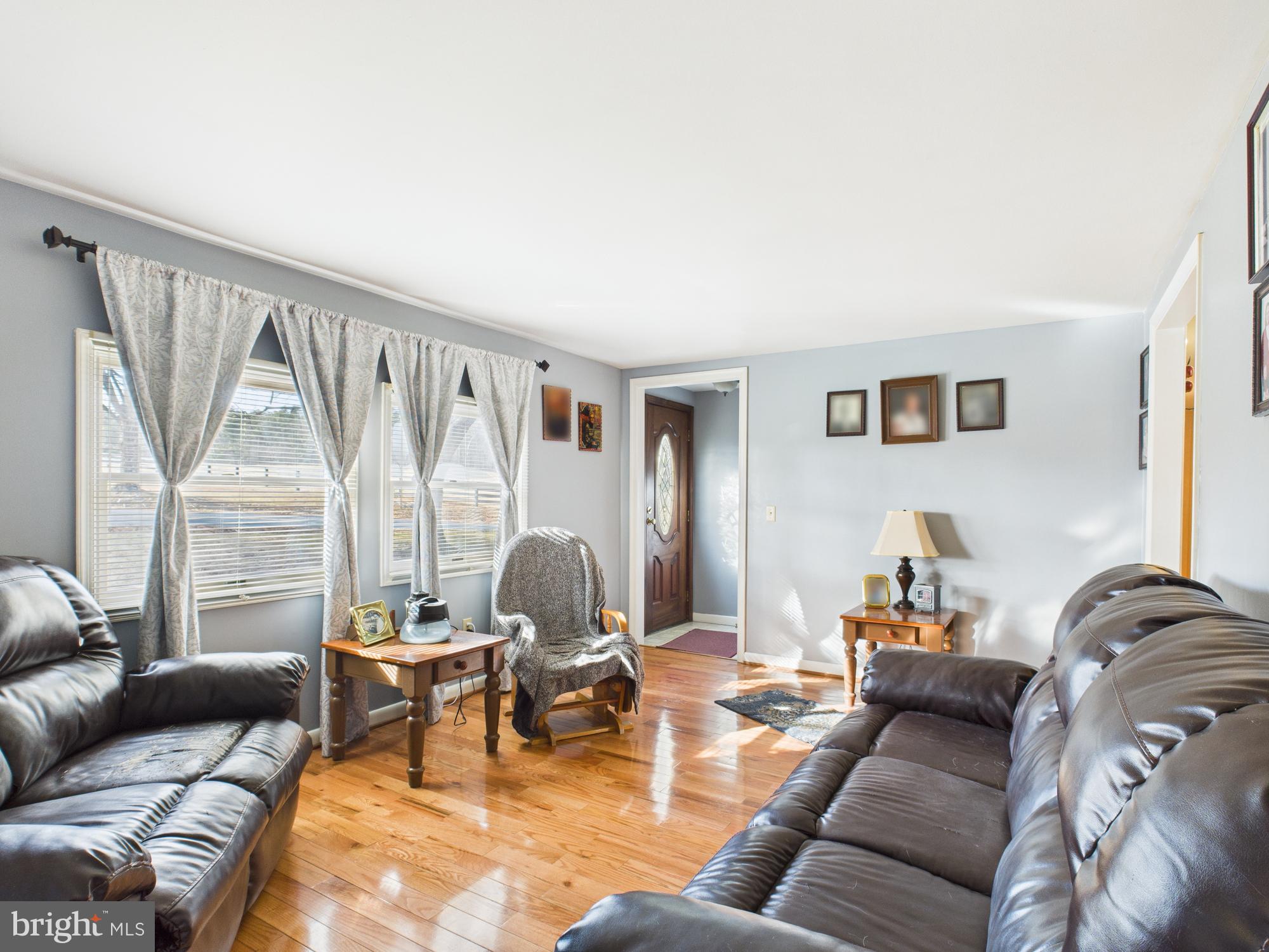 364 Bethel Grange Road Winchester, VA 22603 - Photo 21 of 52 a living room with furniture and a large window