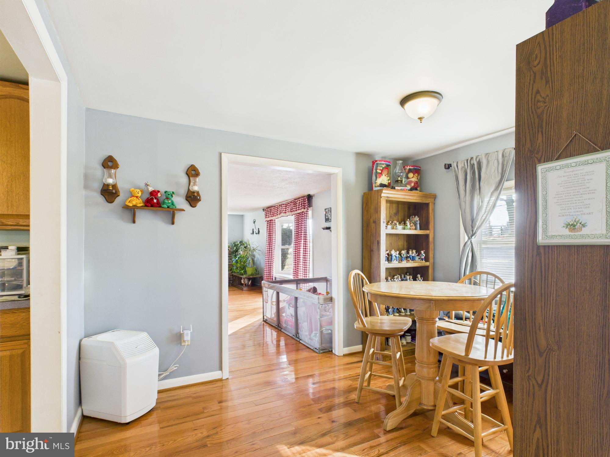 364 Bethel Grange Road Winchester, VA 22603 - Photo 22 of 52 a view of a livingroom with furniture and a wooden floor