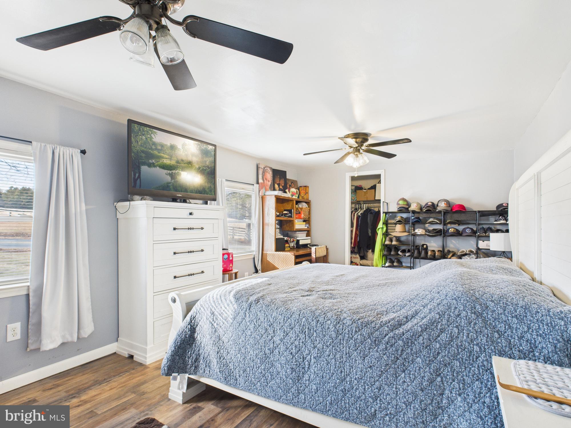 364 Bethel Grange Road Winchester, VA 22603 - Photo 41 of 52 a bedroom with a bed and a flat screen tv