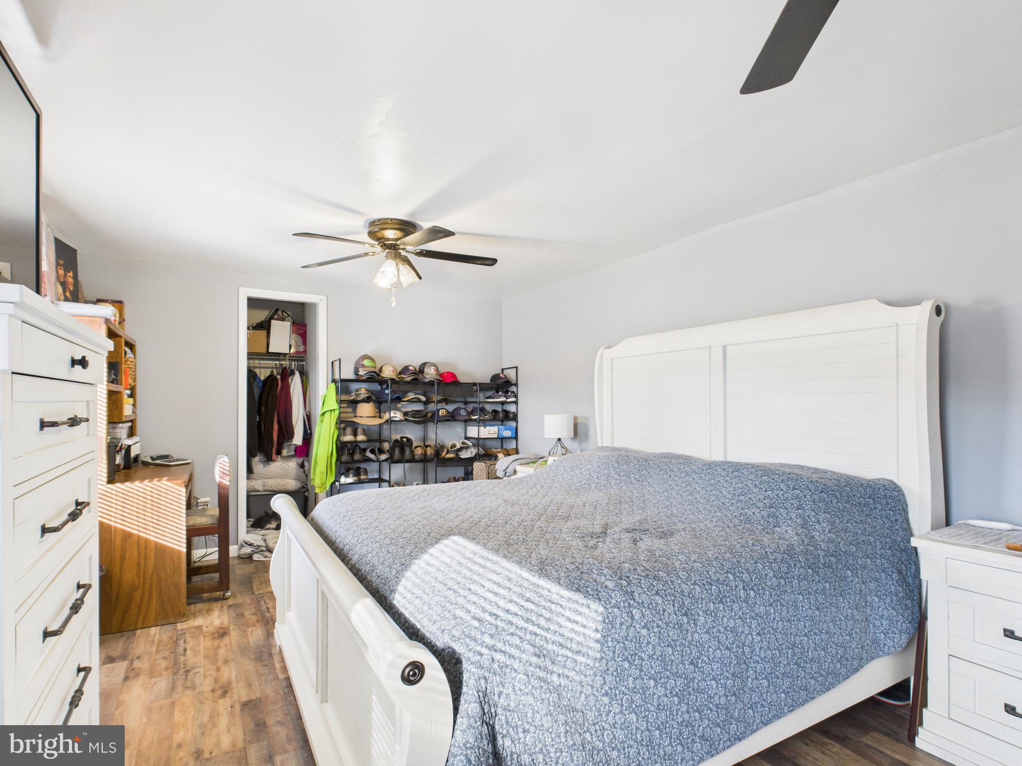 364 Bethel Grange Road Winchester, VA 22603 - Photo 42 of 52 a living room with furniture and a wooden floor