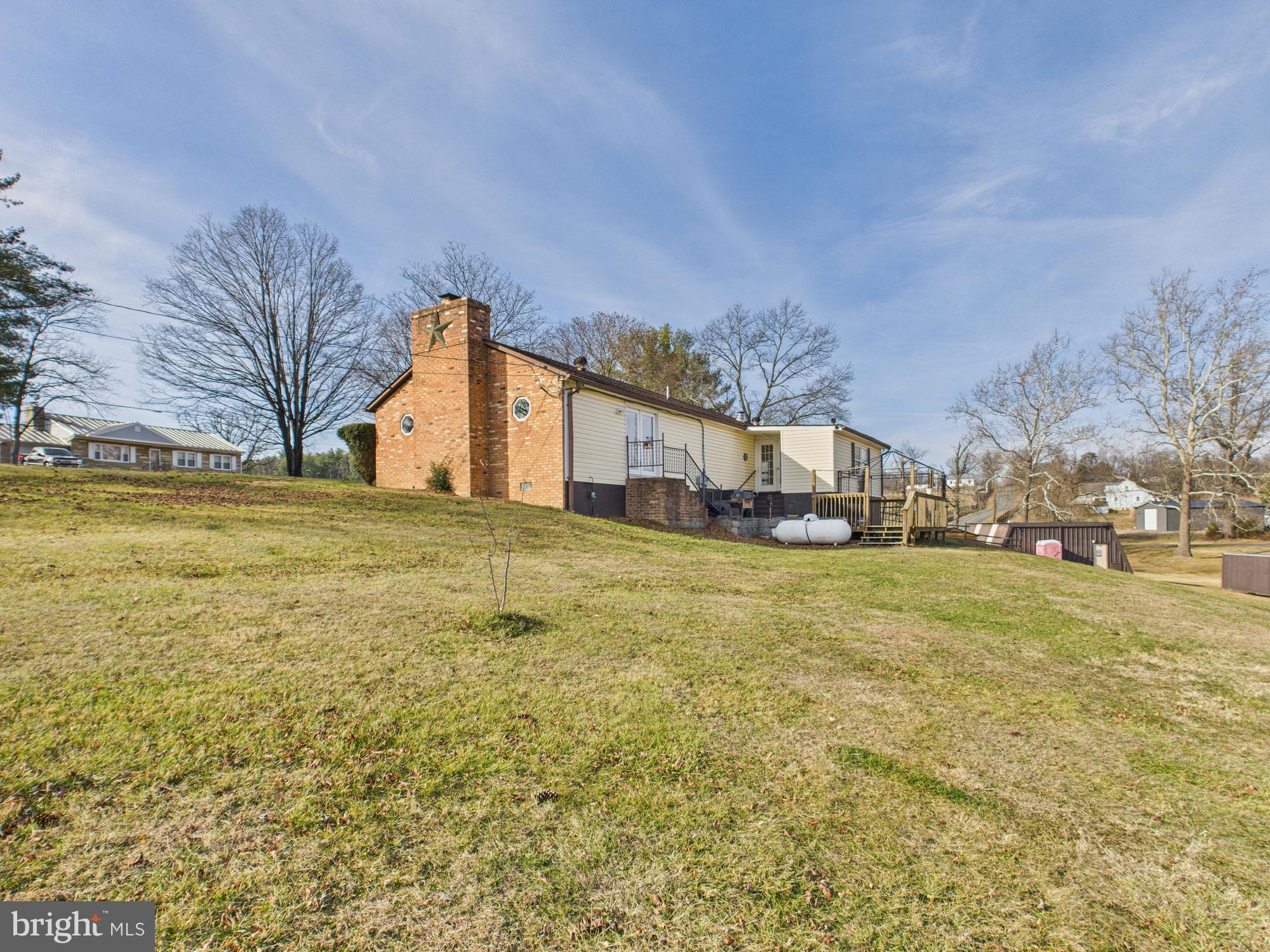 364 Bethel Grange Road Winchester, VA 22603 - Photo 6 of 52 a house view with a swimming pool