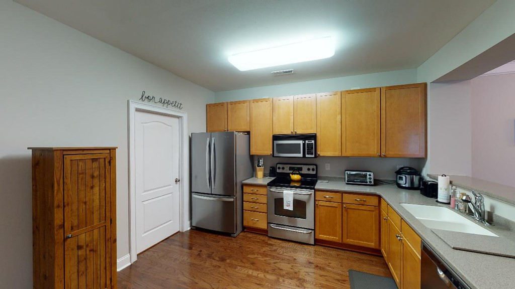 3811 Lunceston Way, Unit 105 Raleigh, NC 27613 - Photo 17 of 49 Kitchen with Stainless Steel Appliances